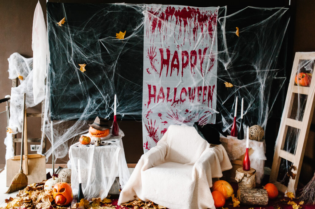 background halloween celebration party night scary pumpkins spider webs blood candles text halloween happy scaled