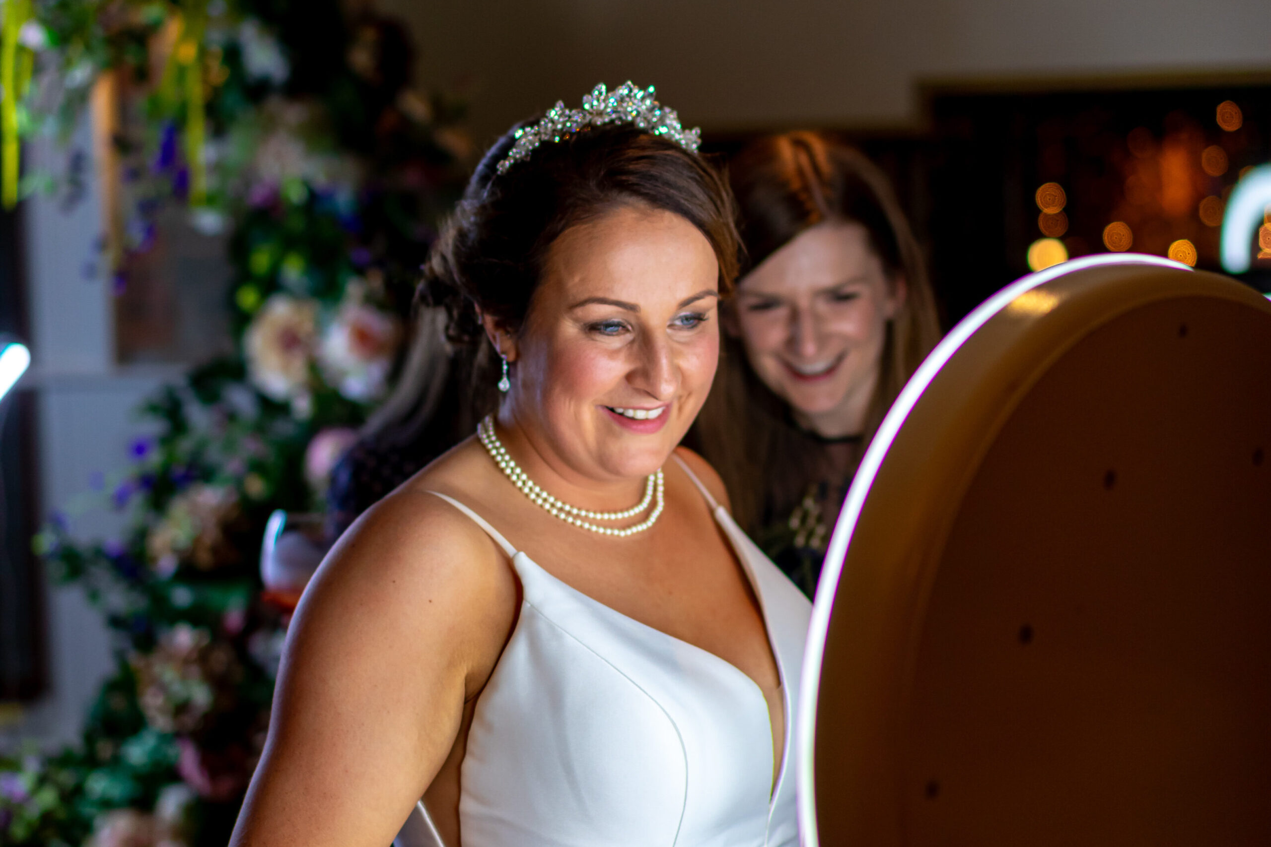 A beautiful bride getting ready to start having her photo taken with her wedding guests on the Mobi Aura